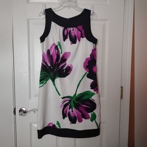 Sleeveless Dress, size 12, made by AGB, bright flower print on white background